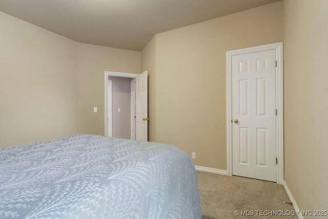 3401 N Narcissus Ave, Broken Arrow, OK 74012 - bedroom featuring light carpet and baseboards