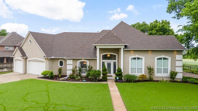 3401 N Narcissus Ave, Broken Arrow, OK 74012 - view of front of home featuring a shingled roof, driveway, and a garage
