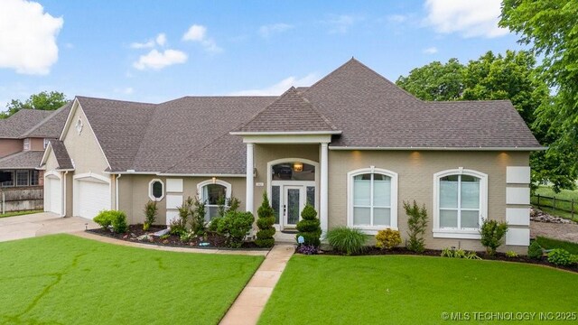 3401 N Narcissus Ave, Broken Arrow, OK 74012 - view of front of property featuring roof with shingles, driveway, and an attached garage