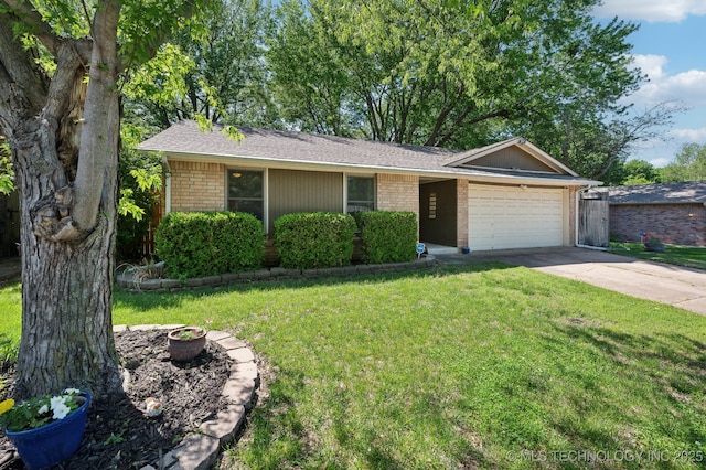 ranch-style house with an attached garage, a front yard, brick siding, and concrete driveway