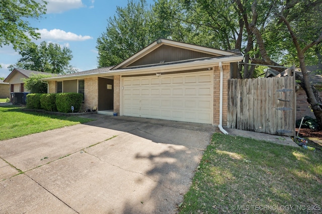 single story home featuring brick siding, a front lawn, an attached garage, and fence