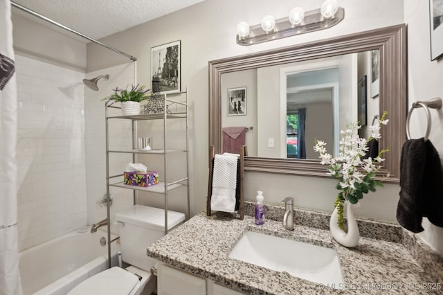 full bathroom with toilet, a textured ceiling, shower / tub combo with curtain, and vanity