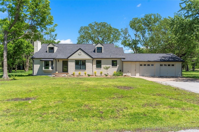 12415 N 75th E Ave, Collinsville, OK 74021 - new england style home featuring a garage, a chimney, concrete driveway, a front yard, and a shingled roof