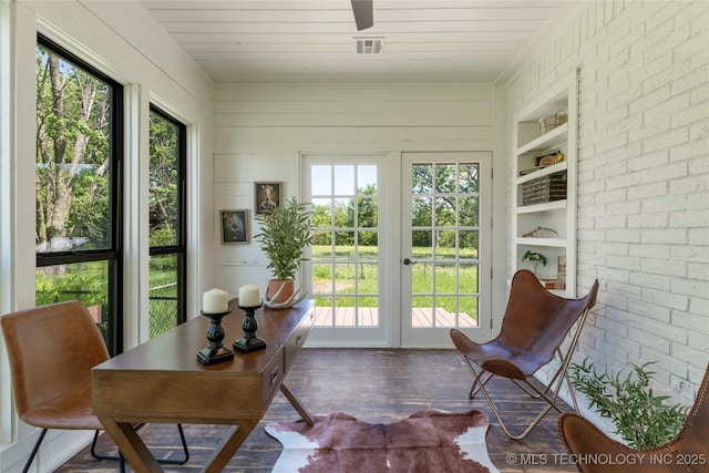 12415 N 75th E Ave, Collinsville, OK 74021 - sunroom / solarium with french doors, healthy amount of natural light, wood finished floors, wooden ceiling, and brick wall