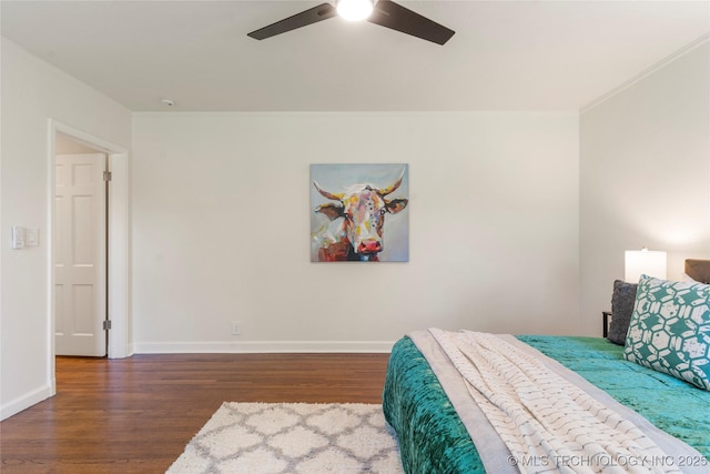 12415 N 75th E Ave, Collinsville, OK 74021 - bedroom with wood finished floors, crown molding, and a ceiling fan