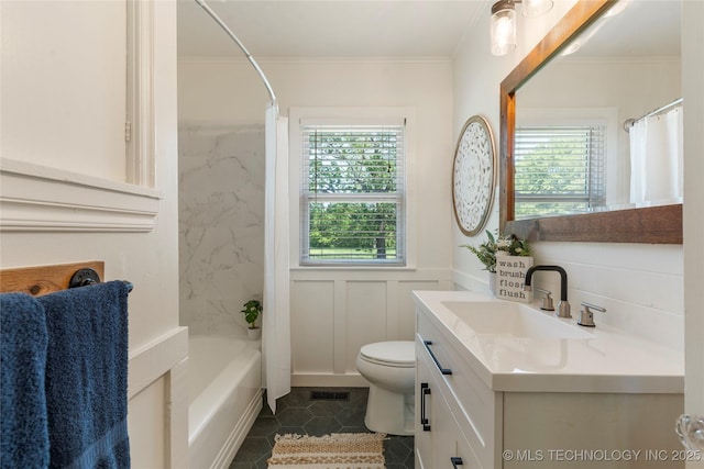 12415 N 75th E Ave, Collinsville, OK 74021 - bathroom with vanity, tile patterned floors, ornamental molding, wainscoting, and shower / bath combo with shower curtain