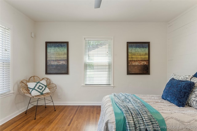 12415 N 75th E Ave, Collinsville, OK 74021 - bedroom with wood finished floors and a ceiling fan