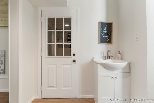 12415 N 75th E Ave, Collinsville, OK 74021 - bathroom with vanity and wood finished floors