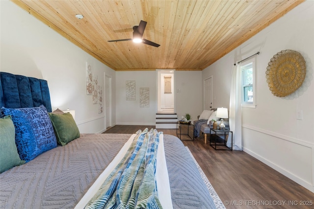 12415 N 75th E Ave, Collinsville, OK 74021 - bedroom featuring wooden ceiling, dark wood finished floors, a ceiling fan, and ornamental molding