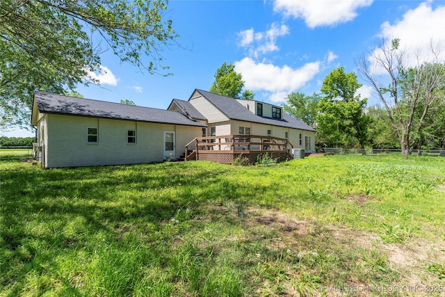 12415 N 75th E Ave, Collinsville, OK 74021 - rear view of property with a wooden deck and brick siding