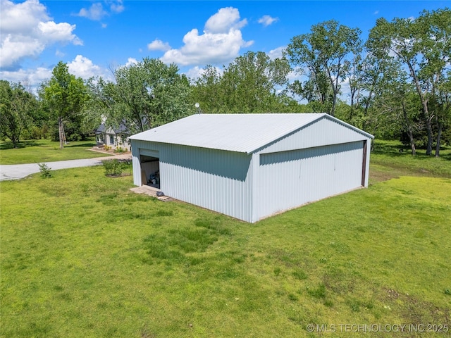 12415 N 75th E Ave, Collinsville, OK 74021 - view of pole building featuring a lawn and view of scattered trees