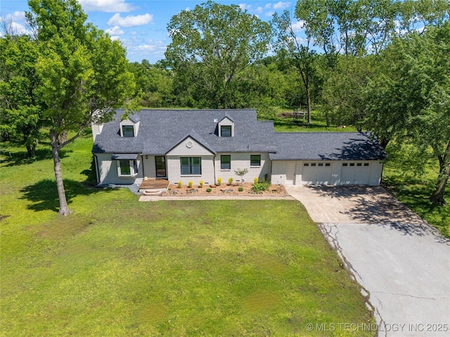 12415 N 75th E Ave, Collinsville, OK 74021 - cape cod house featuring a garage, driveway, a front lawn, and roof with shingles