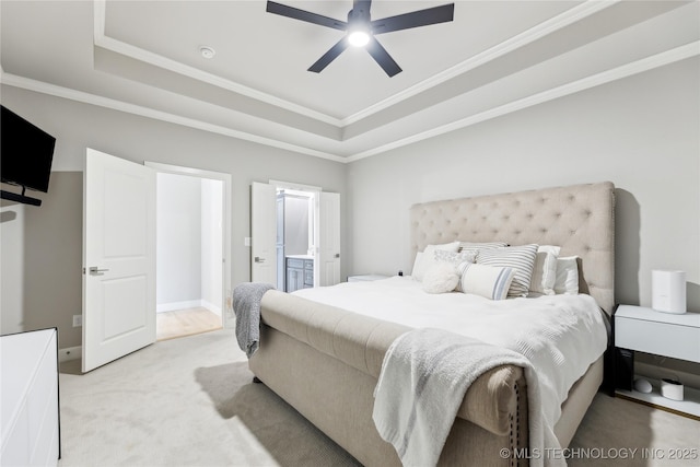 12509 S 102nd E Ave, Bixby, OK 74008 - bedroom with crown molding, light colored carpet, ensuite bathroom, and a raised ceiling