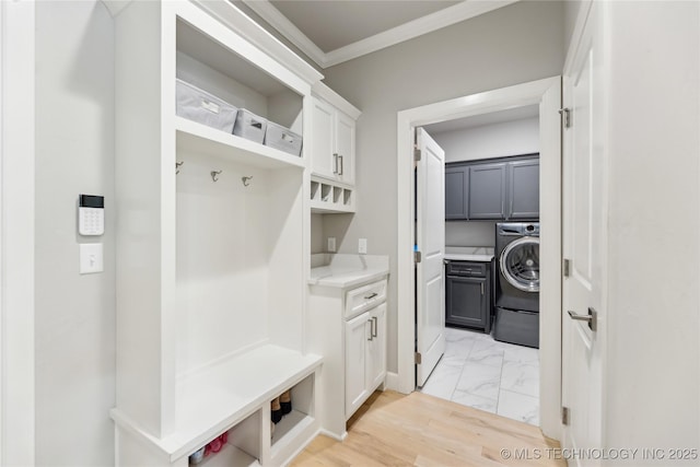 12509 S 102nd E Ave, Bixby, OK 74008 - mudroom featuring crown molding, washer / dryer, and marble finish floor
