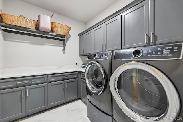 12509 S 102nd E Ave, Bixby, OK 74008 - laundry area featuring cabinet space, separate washer and dryer, and marble finish floor