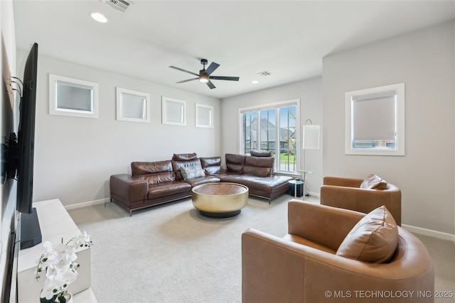 12509 S 102nd E Ave, Bixby, OK 74008 - living area featuring baseboards, a ceiling fan, carpet, and visible vents