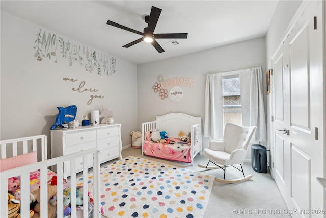 12509 S 102nd E Ave, Bixby, OK 74008 - bedroom with visible vents, a closet, a nursery area, a ceiling fan, and carpet