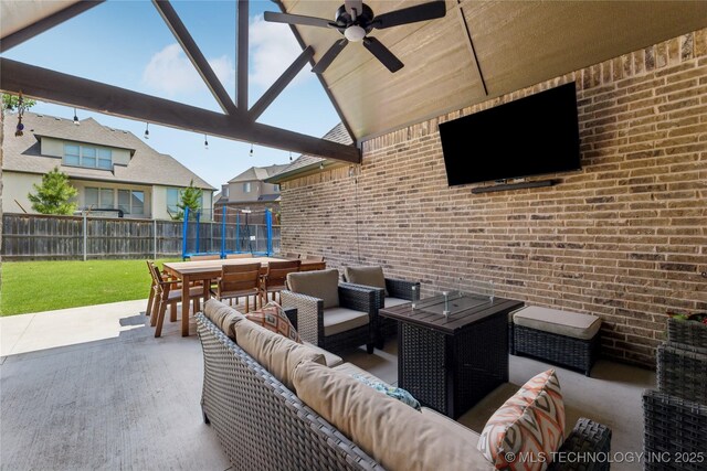 12509 S 102nd E Ave, Bixby, OK 74008 - view of patio featuring an outdoor living space, a ceiling fan, fence, and outdoor dining space