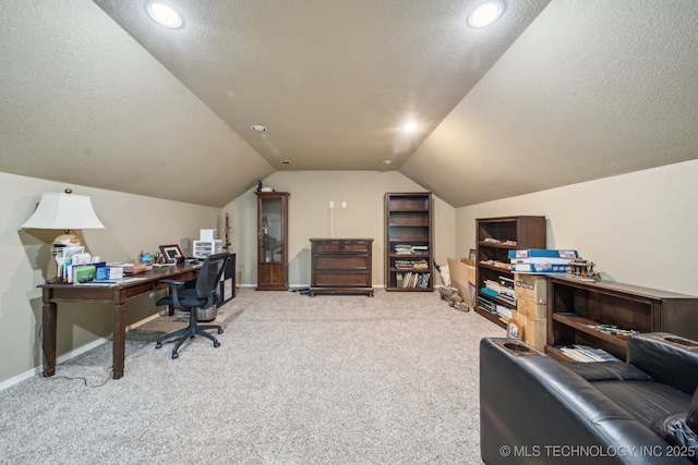 office space with carpet floors, a textured ceiling, recessed lighting, baseboards, and lofted ceiling