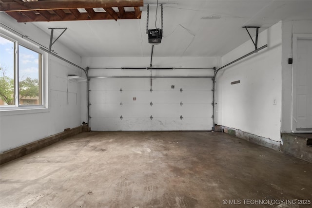 garage featuring a garage door opener