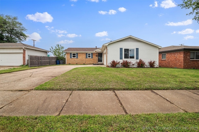 ranch-style home featuring fence, concrete driveway, a front yard, and brick siding