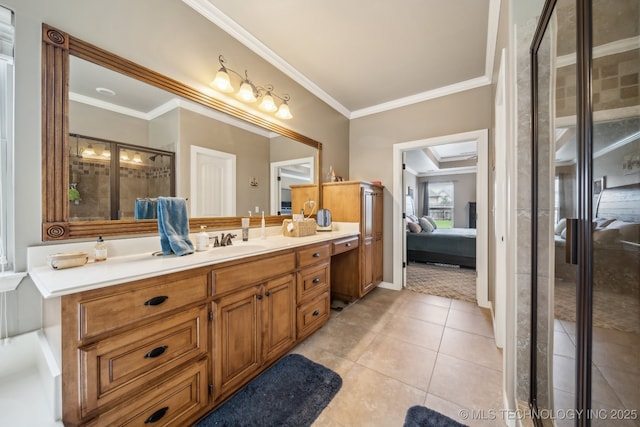 ensuite bathroom featuring crown molding, ensuite bathroom, tile patterned flooring, and vanity