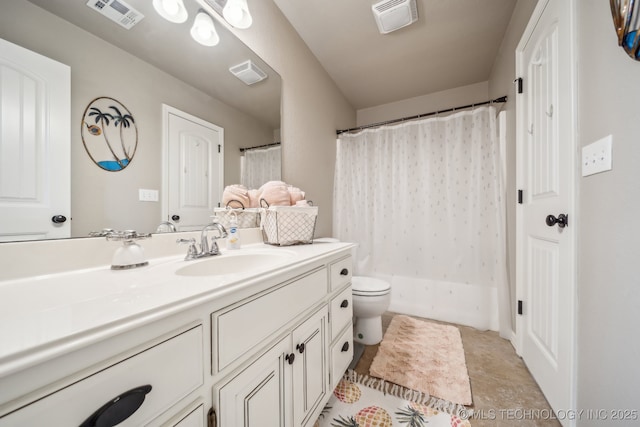 bathroom featuring toilet, visible vents, and vanity