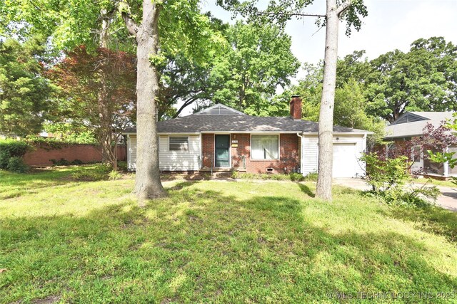 2140 S Columbia Ave, Tulsa, OK 74114 - ranch-style house featuring brick siding, a chimney, a garage, and a front lawn