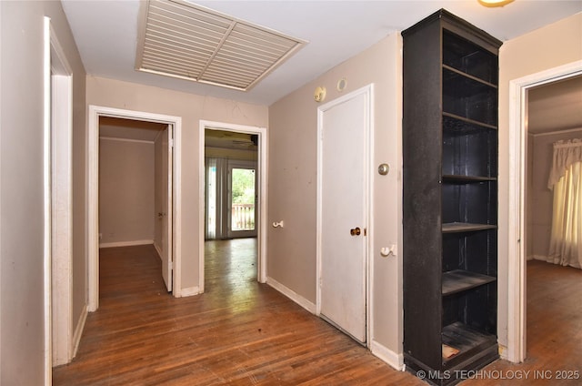 2140 S Columbia Ave, Tulsa, OK 74114 - hallway with wood finished floors and baseboards