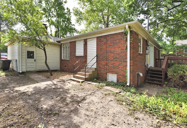 2140 S Columbia Ave, Tulsa, OK 74114 - back of property with brick siding and a wooden deck