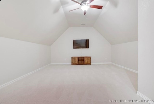 bonus room with ceiling fan, light carpet, baseboards, vaulted ceiling, and visible vents