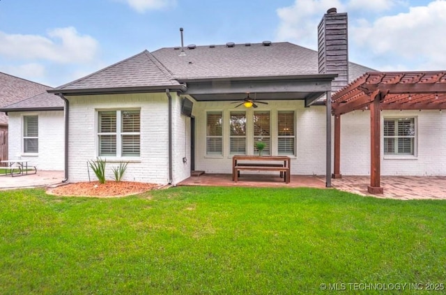 rear view of house with a pergola, ceiling fan, a chimney, and a patio area