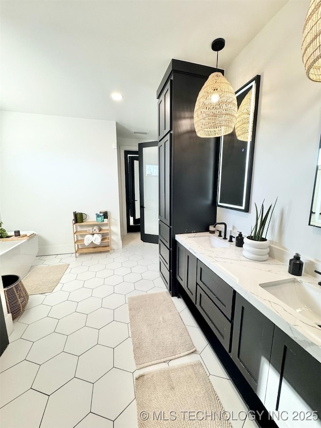 1583 E Clara Ct, Fort Gibson, OK 74434 - full bath with double vanity, recessed lighting, a sink, and tile patterned flooring