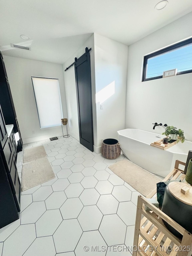 1583 E Clara Ct, Fort Gibson, OK 74434 - full bathroom with a freestanding bath and visible vents