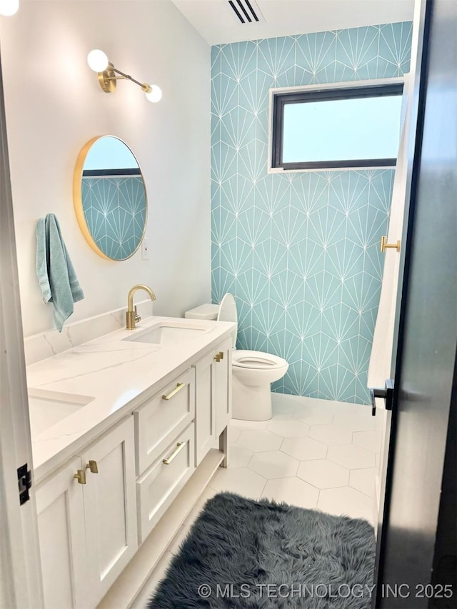 1583 E Clara Ct, Fort Gibson, OK 74434 - bathroom featuring a sink, tile patterned flooring, double vanity, toilet, and visible vents