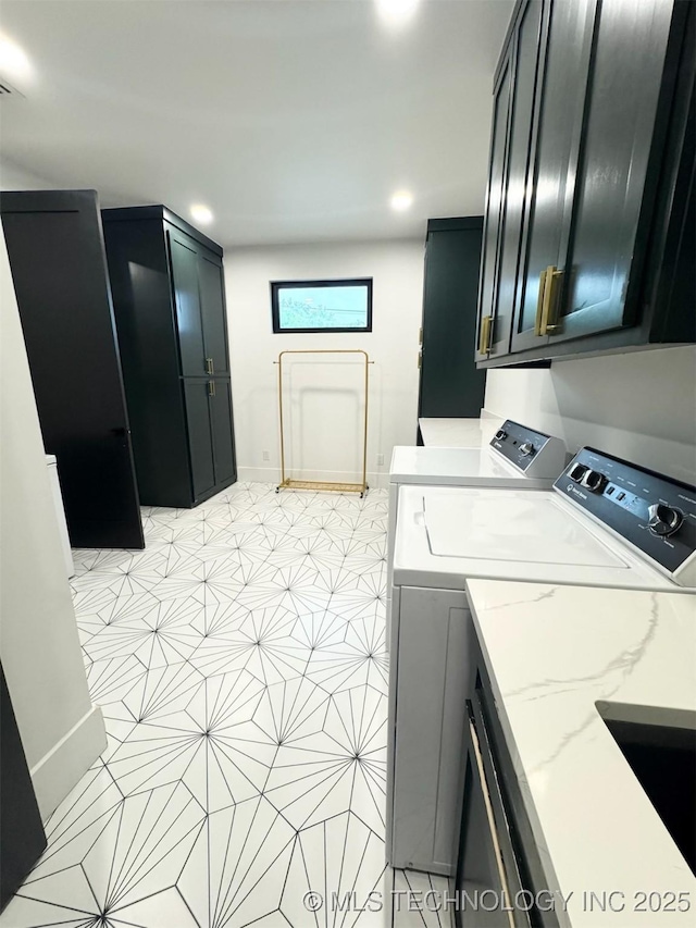 1583 E Clara Ct, Fort Gibson, OK 74434 - washroom with light tile patterned floors, baseboards, independent washer and dryer, and cabinet space