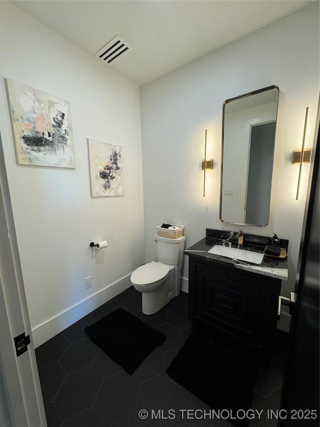 1583 E Clara Ct, Fort Gibson, OK 74434 - bathroom featuring vanity, toilet, tile patterned floors, baseboards, and visible vents