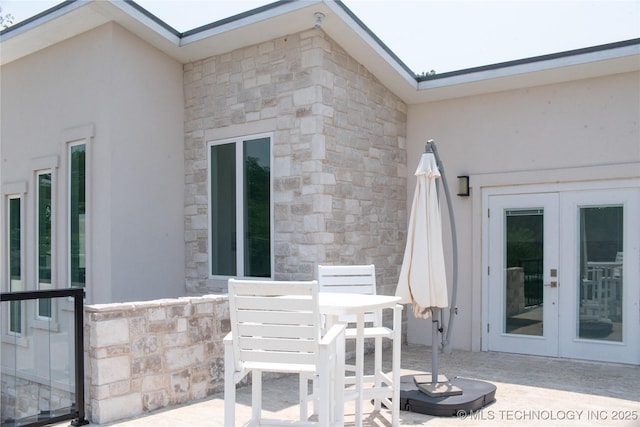 8973 Birch St, Kingston, OK 73439 - exterior space with french doors and outdoor dining area