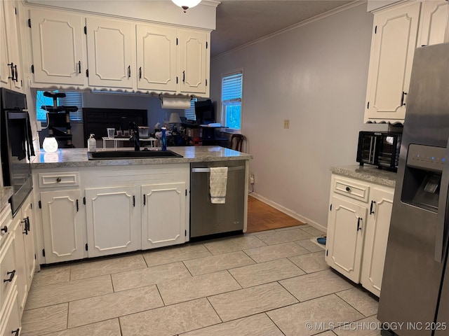 3210 Summit Blvd, Sand Springs, OK 74063 - kitchen with stainless steel appliances, ornamental molding, white cabinetry, and a sink