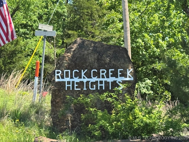 view of community sign