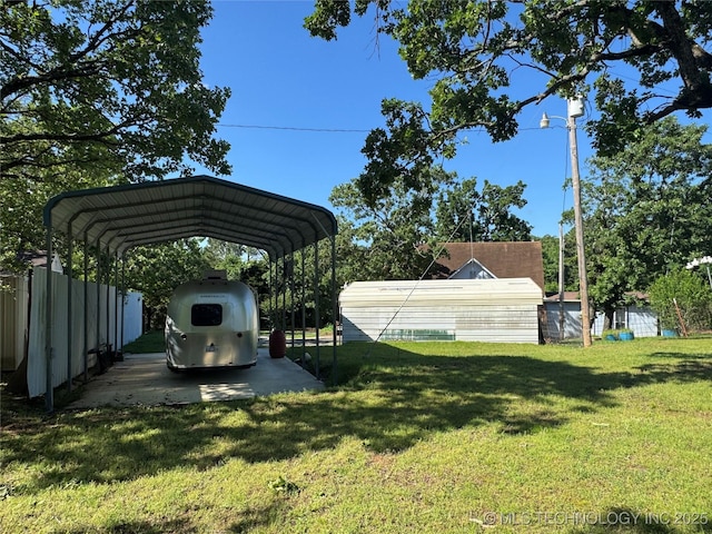 view of vehicle parking featuring a carport
