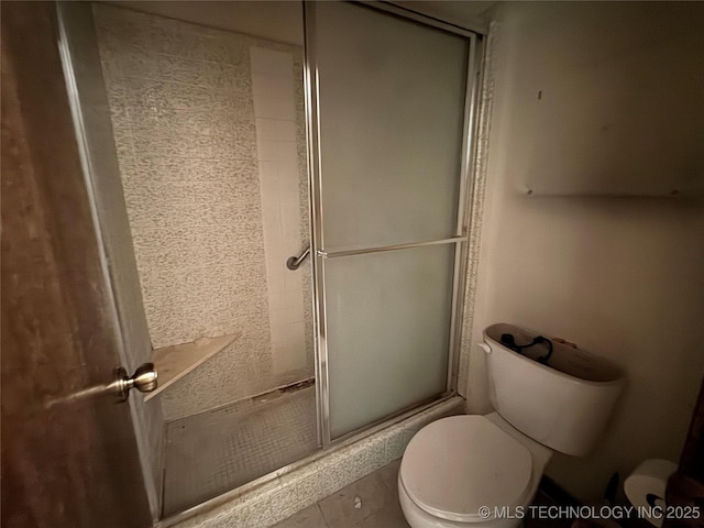 full bath with an enclosed shower and toilet