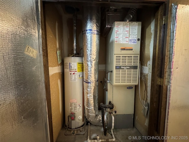 utility room with gas water heater