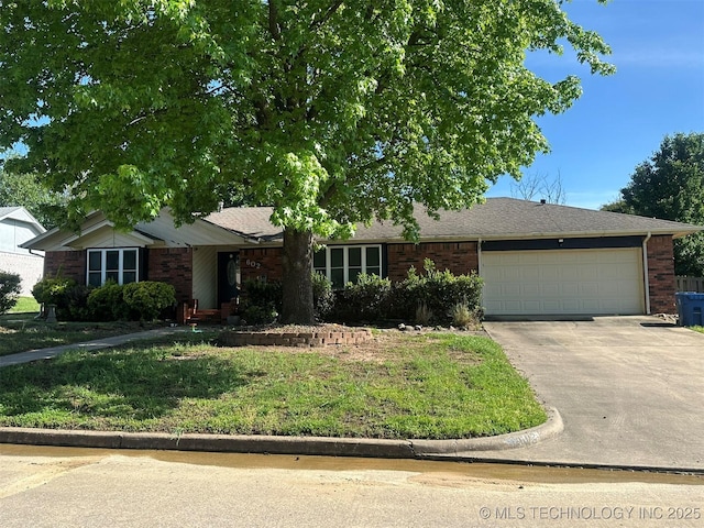 ranch-style home featuring brick siding, driveway, a front lawn, and a garage