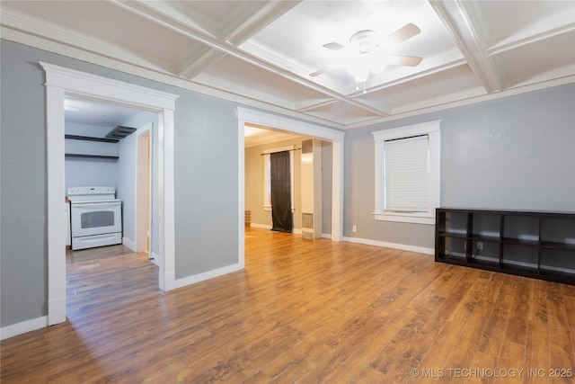 unfurnished living room with baseboards, a ceiling fan, coffered ceiling, and wood finished floors