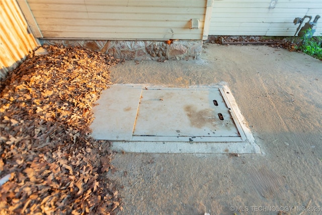view of entry to storm shelter