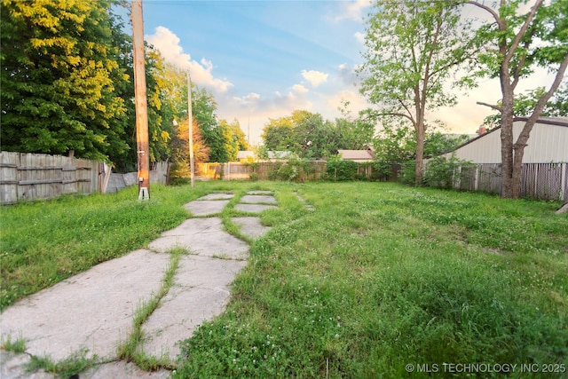 view of yard with fence