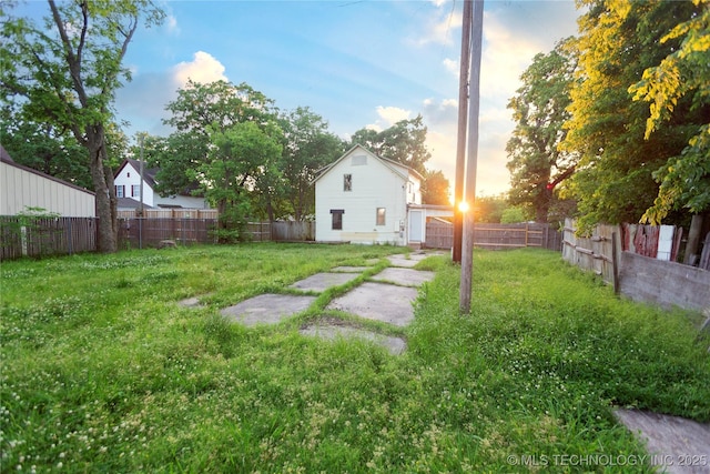 view of yard featuring a fenced backyard