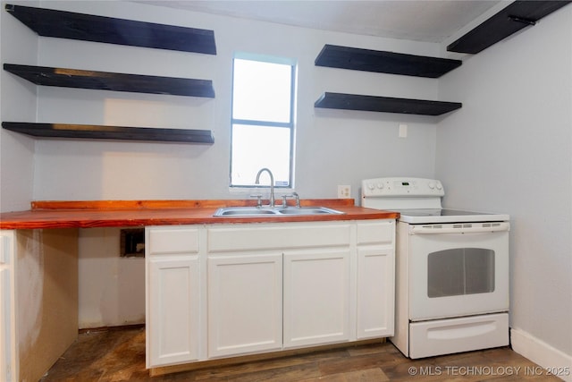 kitchen featuring a sink, electric stove, open shelves, and white cabinetry