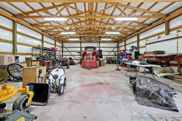 garage with a workshop area